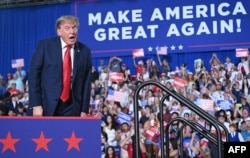 US President Donald Trump arrives to speak during a campaign rally for US Senator Darline Graham in Myrtle Beach, South Carolina, on August 21.