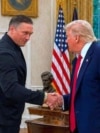 Український боксер Олександр Усик і президент США Дональд Трамп. Білий дім, Вашингтон, 12 червня 2026 року