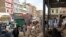 FILE: People survey the scene of a bomb blast in Quetta on April 12.