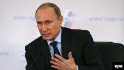 Russian President Vladimir Putin speaks during a business conference in Moscow on March 20