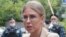 Russian opposition activist Lyubov Sobol speaks to the media as she arrives at a court in Moscow on August 3.
