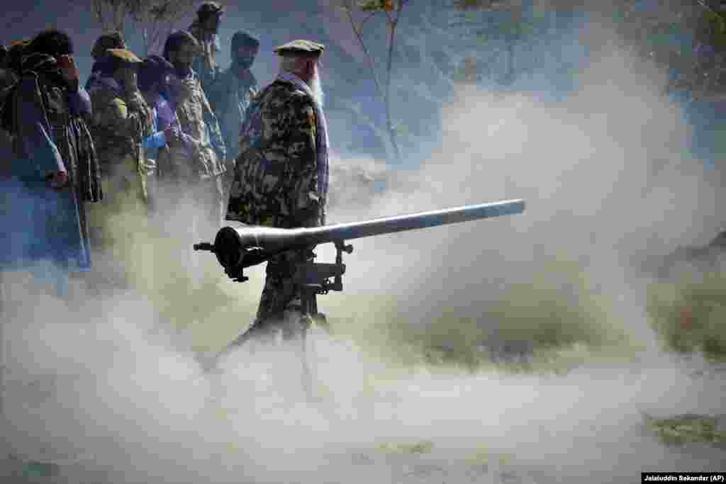 Militiamen loyal to anti-Taliban leader Ahmad Masud take part in a training exercise in Panjshir Province in northeastern Afghanistan on August 30.&nbsp;