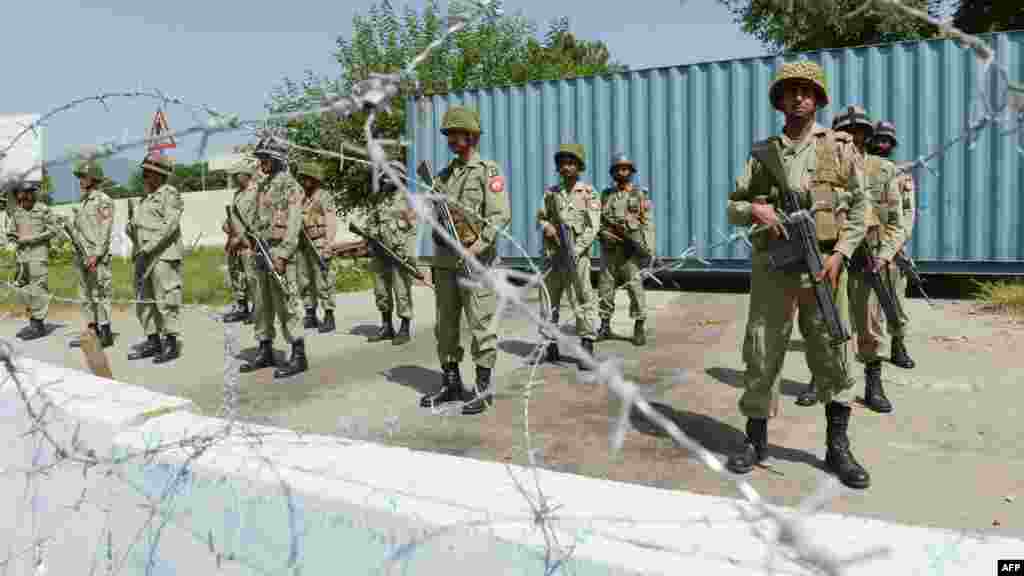 Pakistani rangers cordon of a road linked to the entrance point of the U.S. Embassy in Islamabad.