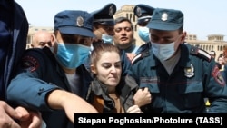 ARMENIA -- Police detain a participant of an opposition rally to demand the resignation of Prime Minister Nikol Pashinian over his handling of the 2020 war with Azerbaijan, April 7, 2021.