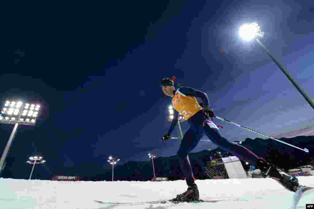 Norway&#39;s Ole Einar Bjoerndalen competes in the mixed biathlon relay. Norway won gold. (AFP/Kirill Kudryavtsev)