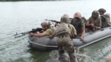 Ukraine - marines on the Dnieper/Dniepro river near Krynky - screen grab. 