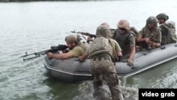 Ukraine - marines on the Dnieper/Dniepro river near Krynky. 