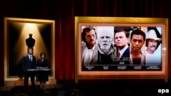 Австралия актеры Chris Hemsworth (с) һәм Академия президенты Cheryl Boone Isaacs 86нчы сезонның намзәтләрен игълан итә. Лос-Анҗелес, 16 гыйнвар 2014