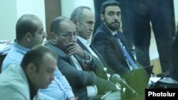 Armenia -- Former President Robert Kocharian (second from right) and his lawyers attend a court hearing in Yerevan, January 9, 2020.