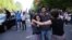 Protesters celebrate at an antigovernment rally in central Yerevan on April 23.
