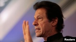 "I will come here [again tomorrow] and I will spend nights here and I will stay here until Nawaz Sharif resigns," Imran Khan said. "We don't accept a prime minister who won and who was appointed after rigged elections."