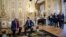 U.S. President Donald Trump and French President Emmanuel Macron meet at Elysee presidential palace.
