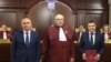 Președintele interimar Ilie Bolojan, președintele Curții Constituționale, Marian Enache, și președintele ales al României, Nicușor Dan, în timpul ceremoniei de validare a alegerilor de la CCR, 22 mai 2025.