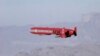 A Pakistani nuclear-capable Ra'ad cruise missile after being launched from a jet fighter during a test firing at an undisclosed location in Pakistan, unadted