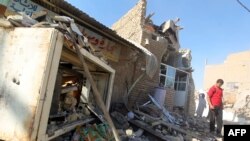 Pamje pas një sulmi të mëparshëm në qytetin Musajib në Irak