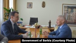 Petar Petkovic (levo), direktor kosovske kancelarije u Vladi Srbije, i Aleksandar Bocan-Harchenko (desno), ruski ambasador, u Beogradu, 1. oktobra 2021., dan nakon što su Srbije i Kosovo postigli sporazum u Briselu.