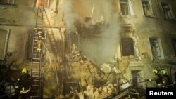 Urmările unui atac cu drone rusești la Odesa, pe 19 martie. Știrile despre distrugerile rusești în țara vecină au alunecat în plan secund de când cu noul conflict, cel cu Iranul, iar Moscova nu se supără deloc.