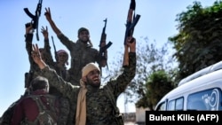 Siriýanyň demokratiýa güýçleriniň agzalary. 16-njy oktýabr, 2017 ý. Rakka