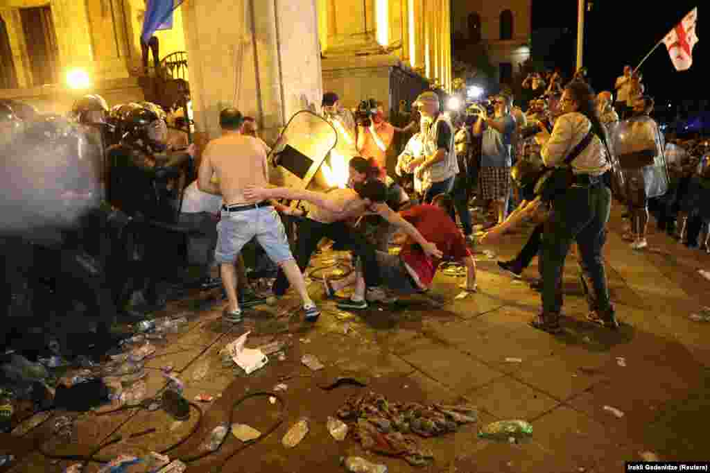 Violent clashes on the steps of the Georgian parliament building in central Tbilisi in the early hours of June 21.&nbsp;