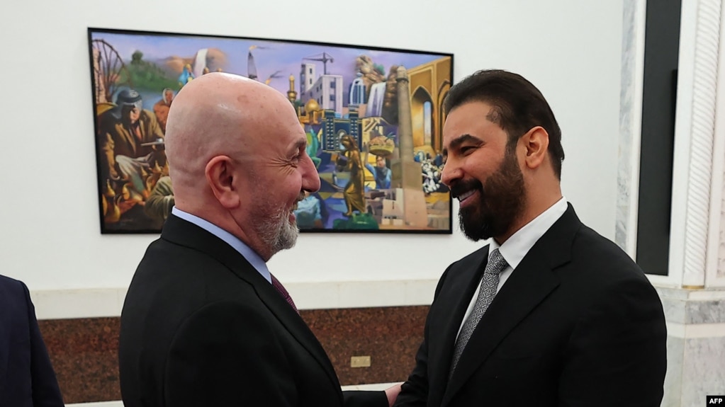 علی الزیدی (سمت راست) در کنار نزار آمیدی، رئیس‌جمهور عراق