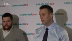 Ґрати на вікнах і побитий волонтер – поліція заблокувала штаб Навального в Москві (відео)