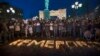 People commemorate the victims of the March 25 fire in a shopping mall in the Siberian city of Kemerovo in Moscow's Pushkin Square on March 27.