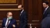 Armenia -- Prime Minister Nikol Pashinian, parliament speaker Ararat Mirzoyan (C) and his deputy Alen Simonian (R) arrive for the Armenian government's question-and-answer session in the National Assembly, Yerevan, March 3, 2021.