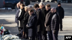 World leaders pay their respects during a ceremony in Independence Square in Kyiv