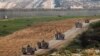حرکت خودروهای زرهی اسرائیلی در جنوب اسرائیل در امتداد مرز نوار غزه