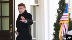 French President Emmanuel Macron, arrives at the White House on February 24. 