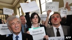 Nobel Peace Laureate Elie Wiesel (left) stands among Jewish sympathizers and demonstrators after Iranian President Mahmud Ahmadinejad's speech at the opening of the UN conference on racism.