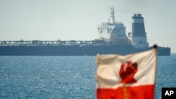 A view of the Grace 1 super tanker in the British territory of Gibraltar, Thursday, July 4, 2019. (AP Photo/Marcos Moreno)