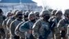 U.S. -- Members of the U.S. National Guard arrive as the US Capitol goes into lockdown after an "external security threat" prior to a dress rehearsal for the 59th inaugural ceremony for President-elect Joe Biden and Vice President-elect Kamala Harris at 