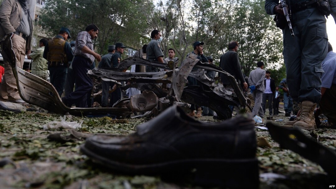 A victim's shoe lies on the ground as police secure the site of a suicide attack in Kabul last month.