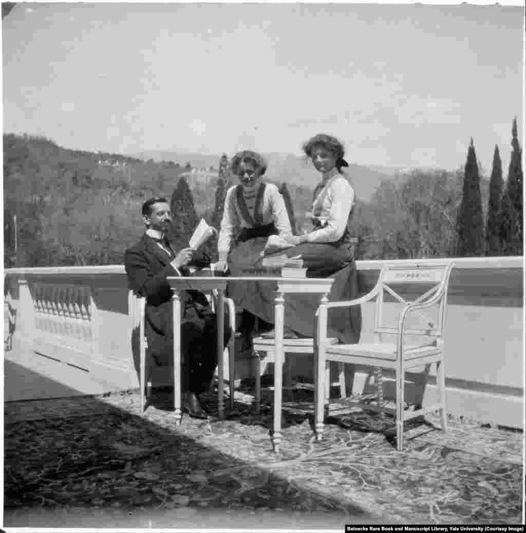 Pierre Gilliard, the family&#39;s French tutor, with his pupils Olga and Tatyana Romanov. Gilliard was another of the family&#39;s retinue who joined them in captivity. After the murders, he assisted the investigation into the killings before fleeing Russia as Vladimir Lenin tightened his grip on power. He died in Switzerland in 1962.