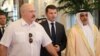 Belarusian President Alyaksandr Lukashenka (left) is welcomed upon his arrival at the Presidential Airport in Abu Dhabi on November 1. 