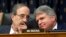 In this archive photo of February 13, 2019, the President of the Foreign Affairs Committee of the House of Representatives, Democrat Eliot Engel (L) talking with his Republican colleague Michael McCaul, during a hearing in Washington. 