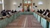 Iranian Foreign Minister Mohammad Javad Zarif (center) addresses delegations of Afghanistan (left) and the Taliban (right) at the Iranian Foreign Ministry in Tehran on July 7.