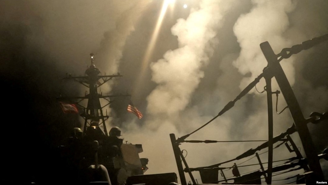 A ship fires missiles at an undisclosed location after U.S. President Donald Trump launched military strikes against Yemen's Iran-aligned Houthis on March 15, 2025. 