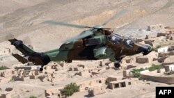 Residents of the Turkmen village of Marchak say that the sound of gunfire to the south in Afghanistan is becoming routine and that military helicopters have been regularly flying overhead as they apparently patrol the border (file photo)