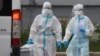 Paramedics wear special suits to protect against the coronavirus in Minsk. (file photo)