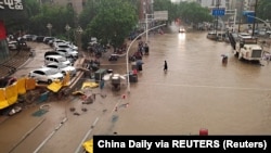 Pamje nga provinca Henan, e mbushur me ujë, pas shiut.