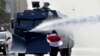 BELARUS -- Belarusian police uses water cannons do disperse protesters during an opposition protest in Minsk, October 4, 2020