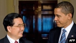 U.S. President Barack Obama (right) meets and his Chinese counterpart Hu Jintao pledged to increase cooperation.