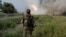 UKRAINE – Soldiers of the Ukrainian Armed Forces’ 93rd “Kholodny Yar” Brigade fire on Russian positions using a BM-21 “Grad” multiple rocket launcher system near Kramatorsk in the Donetsk region on August 4, 2026