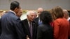 EU High Representative for Foreign Affairs and Security Policy Josep Borrell (third left) speaks with a group of EU foreign ministers in Brussels, November 13, 2023. 