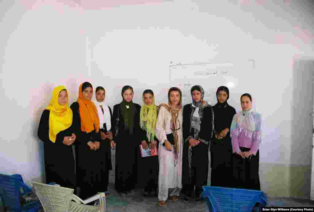 A group of middle-school girls who were, after five years of being denied the right to an education by the Taliban, excited to be attending school. The girl in the middle had just tearfully told me the story of how her parents were killed by the Taliban. She told me, &ldquo;The day the Americans leave, the Taliban will return and execute us girls if we try to learn to read and write.&quot;