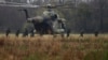 Serbian soldiers disembark from MI-8 helicopter during a joint Serbian-Russian Slavic Brotherhood exercise in the town of Kovin, near Belgrade, in November 2016.