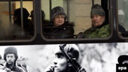 Rumunija -- Autobus gradskog prevoza u Temišvaru na kome su fotografije povodom 20 godina od demokratske revolucije u Rumuniji, jubileja koji je obeležen u decembru 2009. godine