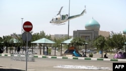 Aýatolla Ruhollah Homeininiň guburynyň golaýynda, Tähran, 7-nji iýun, 2017